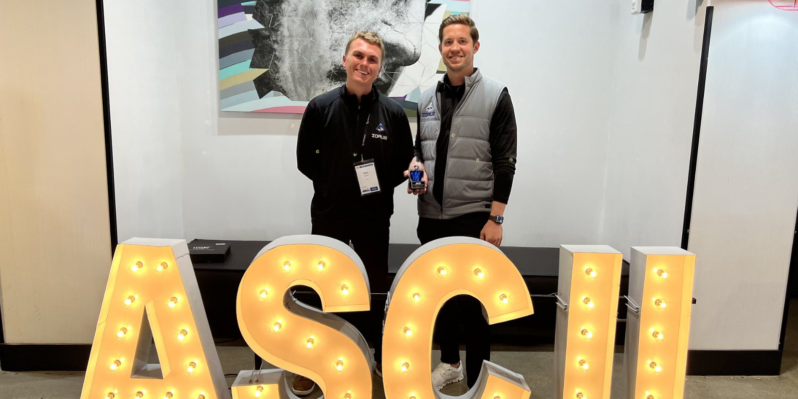 Chris Keith accepting an ASCII award with Max Ruhnke